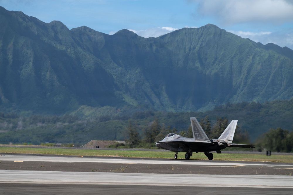 Total Force Airmen Execute Integrated Combat Turn for F-22 Raptors