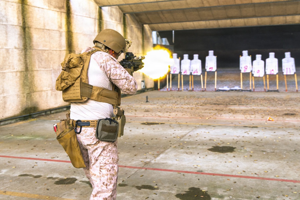 Reconnaissance Marines with the 24th Marine Expeditionary Unit conduct rifle and pistol drills