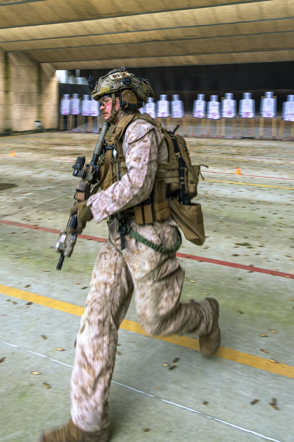 Reconnaissance Marines with the 24th Marine Expeditionary Unit conduct rifle and pistol drills