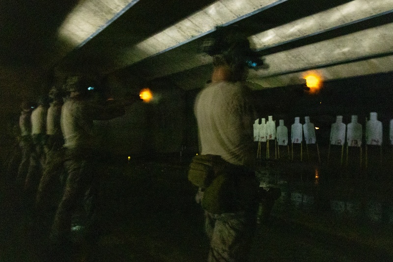 Reconnaissance Marines with the 24th Marine Expeditionary Unit conduct rifle and pistol drills
