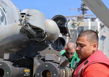 Helicopter Maritime Strike Squadron (HSM) 79 Installs Hellfire Missiles