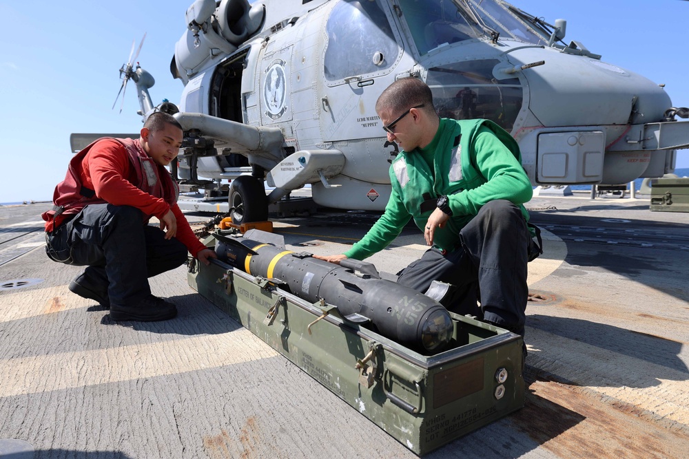 Helicopter Maritime Strike Squadron (HSM) 79 Installs Hellfire Missiles