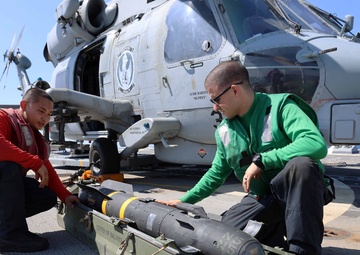 Helicopter Maritime Strike Squadron (HSM) 79 Installs Hellfire Missiles