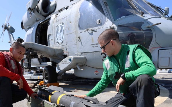 Helicopter Maritime Strike Squadron (HSM) 79 Installs Hellfire Missiles