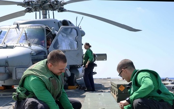 Helicopter Maritime Strike Squadron (HSM) 79 Installs Hellfire Missiles