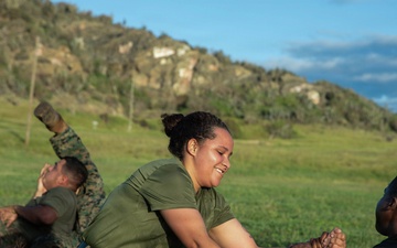 Service Members engage in Joint Physical Training