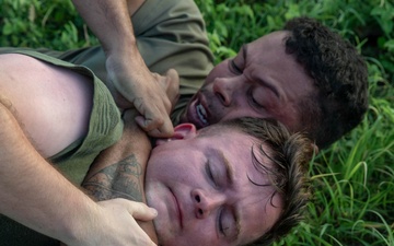 Service Members engage in Joint Physical Training