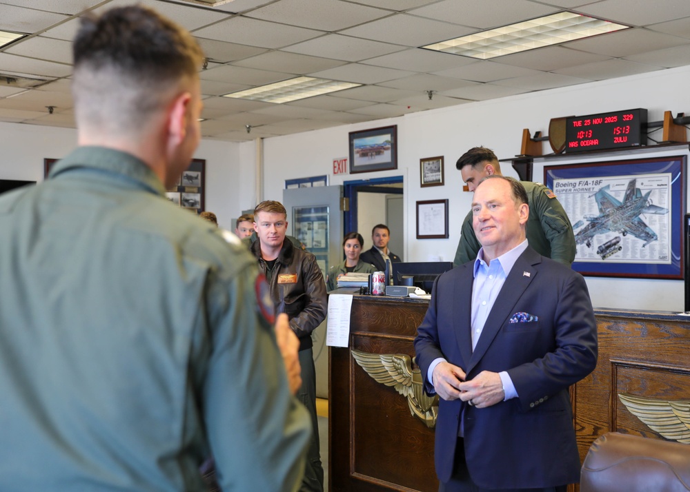 The Honorable John C. Phelan, Secretary of the Navy, speaks to the U.S. Navy Sailors