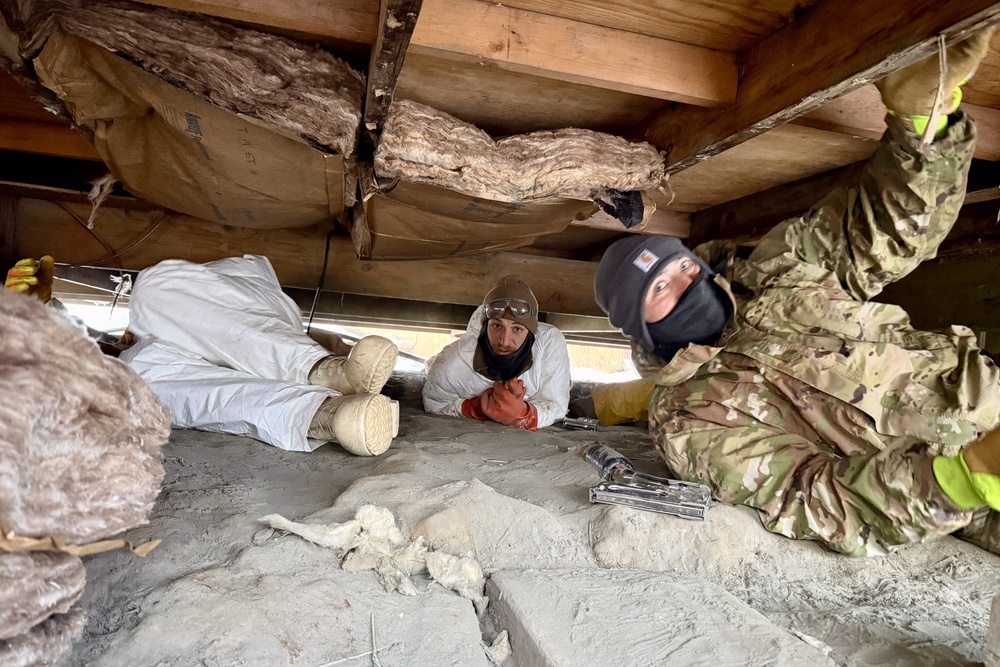 AKOM members clear debris at Tuntutuliak Operation Halong Response
