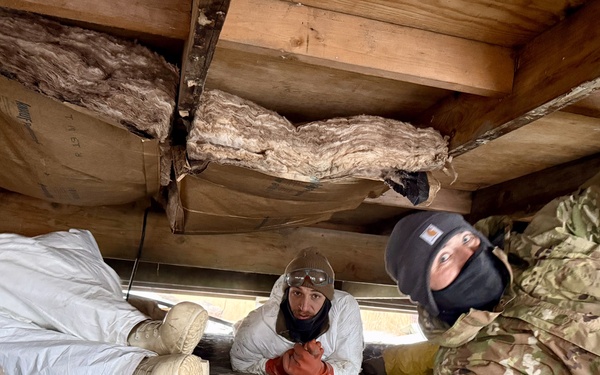 AKOM members clear debris at Tuntutuliak Operation Halong Response