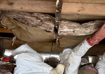 AKOM members clear debris at Tuntutuliak Operation Halong Response