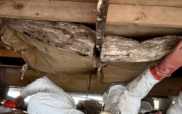 AKOM members clear debris at Tuntutuliak Operation Halong Response