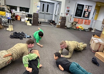 AKOM members clear debris at Tuntutuliak Operation Halong Response