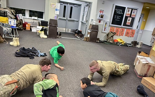 AKOM members clear debris at Tuntutuliak Operation Halong Response