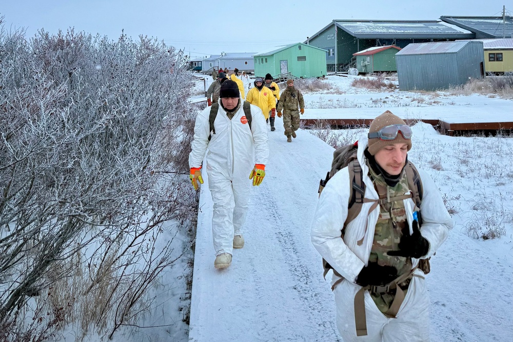 AKOM members clear debris at Tuntutuliak Operation Halong Response