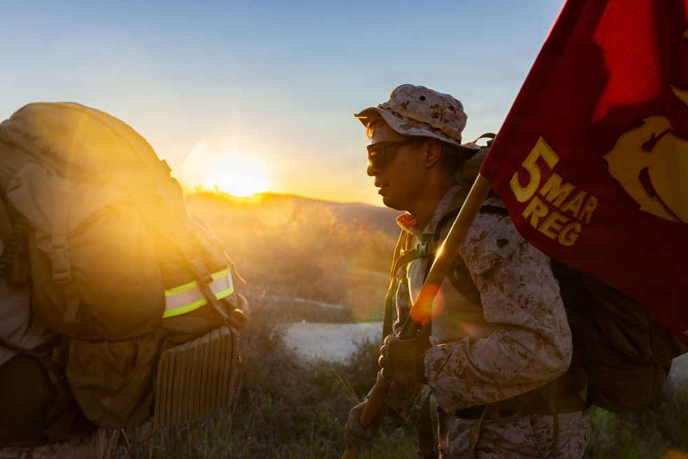 Headquarters Company, 5th Marines participate in conditioning hike