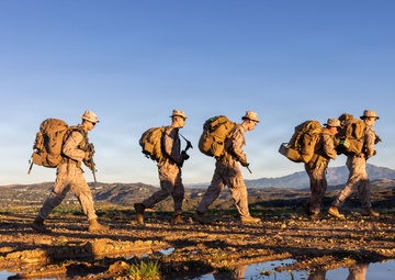 Headquarters Company, 5th Marines participate in conditioning hike