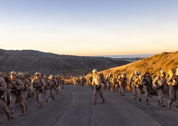 Headquarters Company, 5th Marines participate in conditioning hike