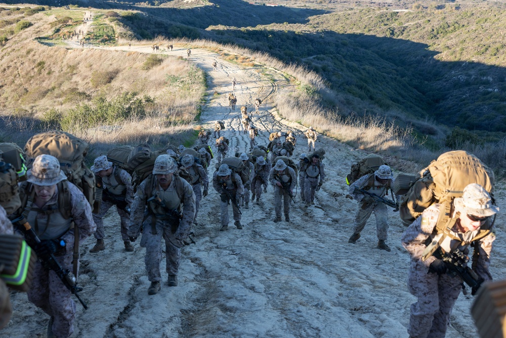 Headquarters Company, 5th Marines participate in conditioning hike