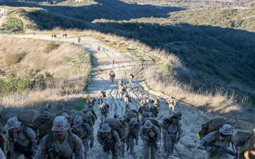 Headquarters Company, 5th Marines participate in conditioning hike