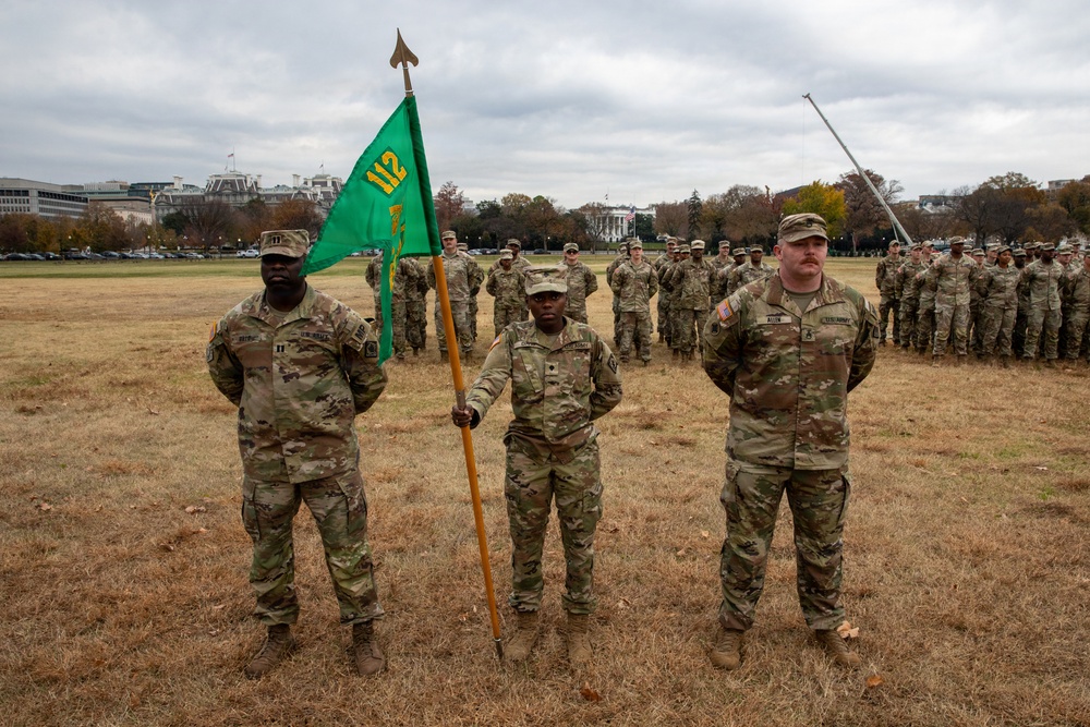 112th Military Police Battalion service members take a photo in front of the White House