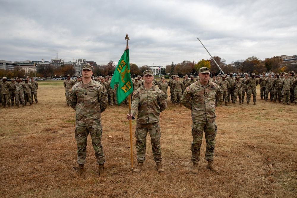 112th Military Police Battalion service members take a photo in front of the White House