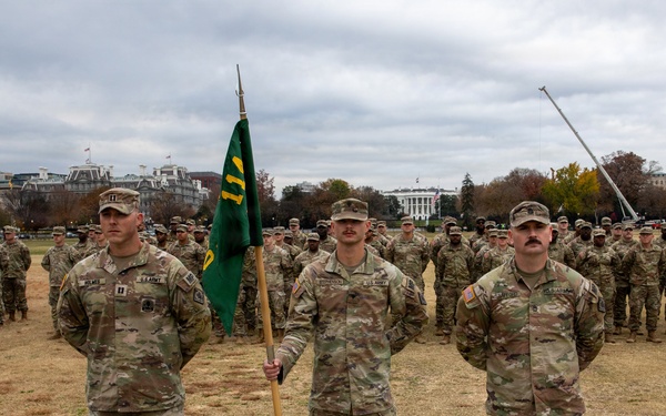 112th Military Police Battalion service members take a photo in front of the White House