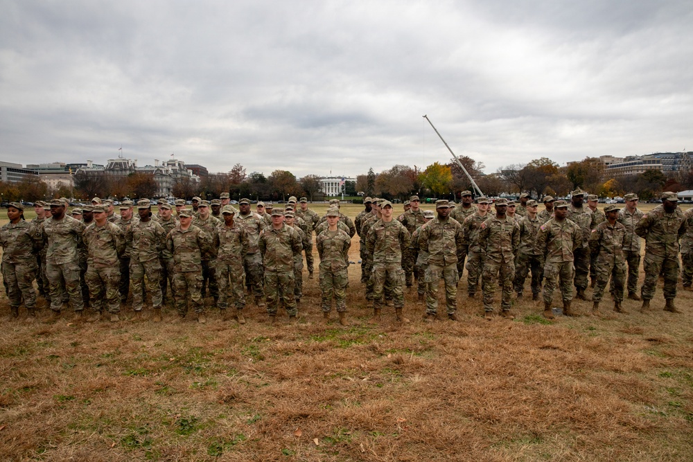 112th Military Police Battalion service members take a photo in front of the White House