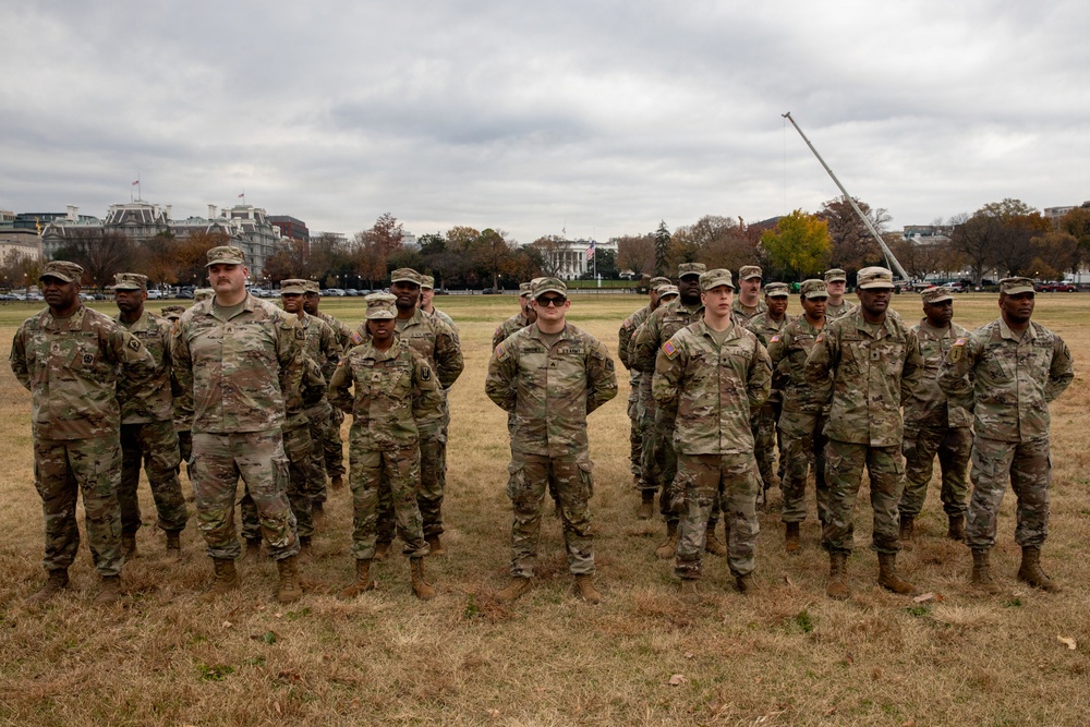 112th Military Police Battalion service members take a photo in front of the White House