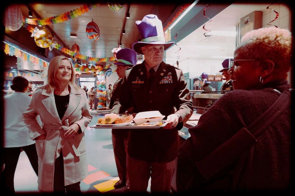 Compassion in Action: Commander and Spouse Help Civilian During Holiday Dining Facility Service