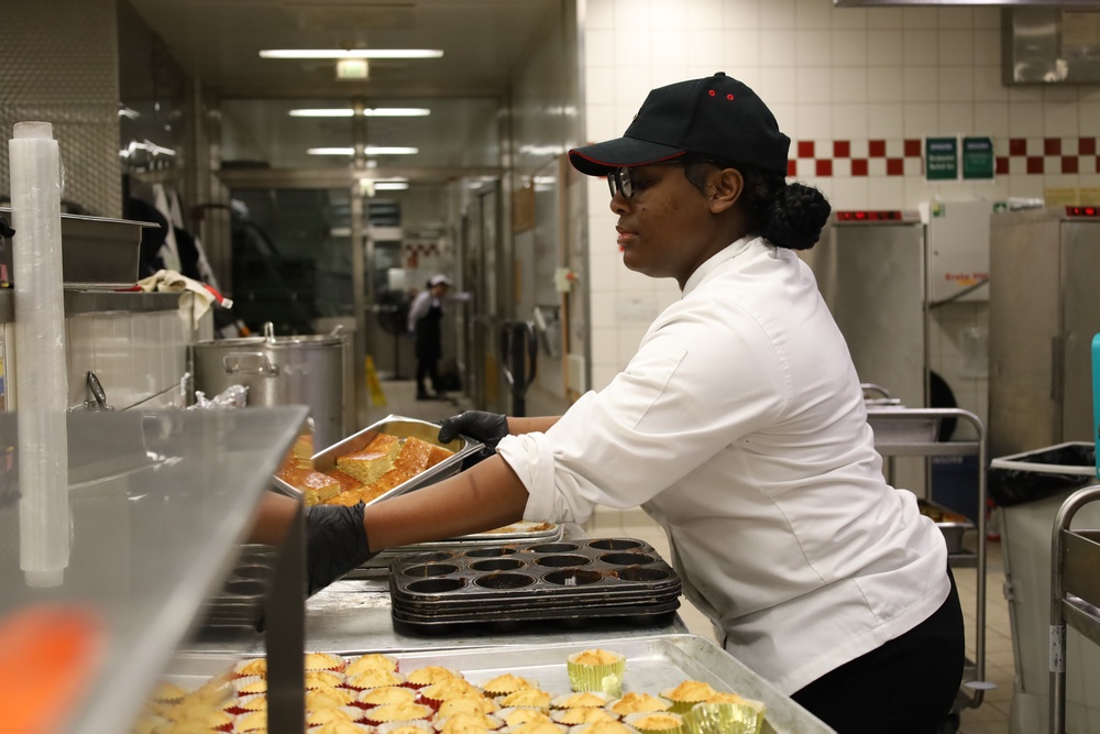 Thanksgiving Service Begins Early as Soldier Prepares Meals for Fellow Soldiers