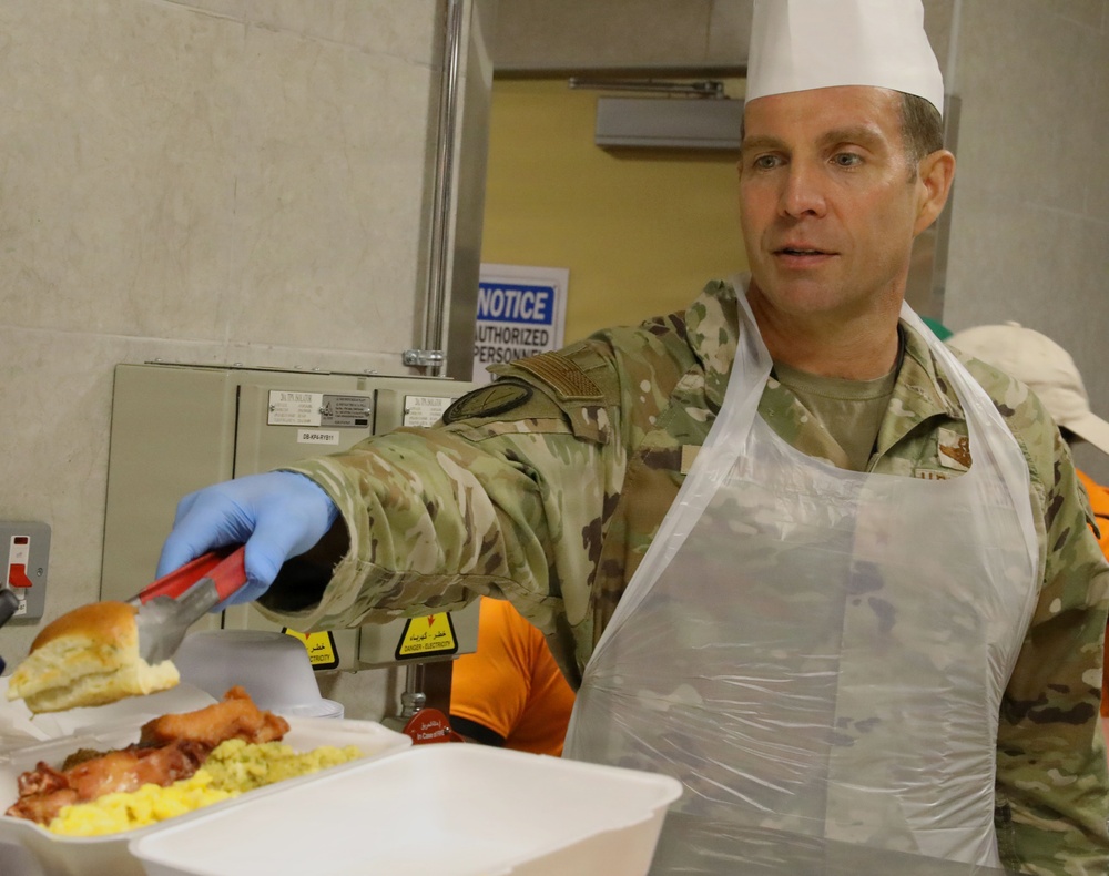 Soldiers are served Thanksgiving dinner at Camp Arifjan, Kuwait