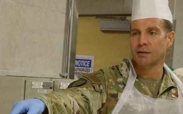 Soldiers are served Thanksgiving dinner at Camp Arifjan, Kuwait