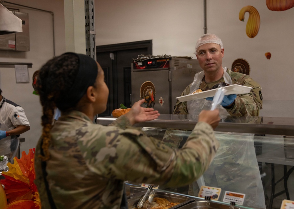 Soldiers are served up a Thanksgiving Meal courtesy of DFACs and Leadership