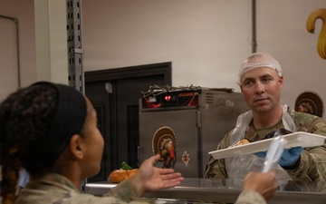 Soldiers are served up a Thanksgiving Meal courtesy of DFACs and Leadership