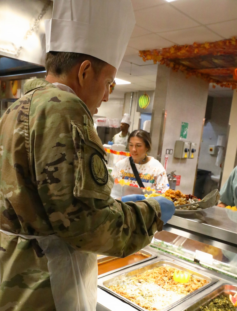 Soldiers are served Thanksgiving dinner at Camp Arifjan, Kuwait