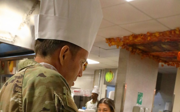 Soldiers are served Thanksgiving dinner at Camp Arifjan, Kuwait