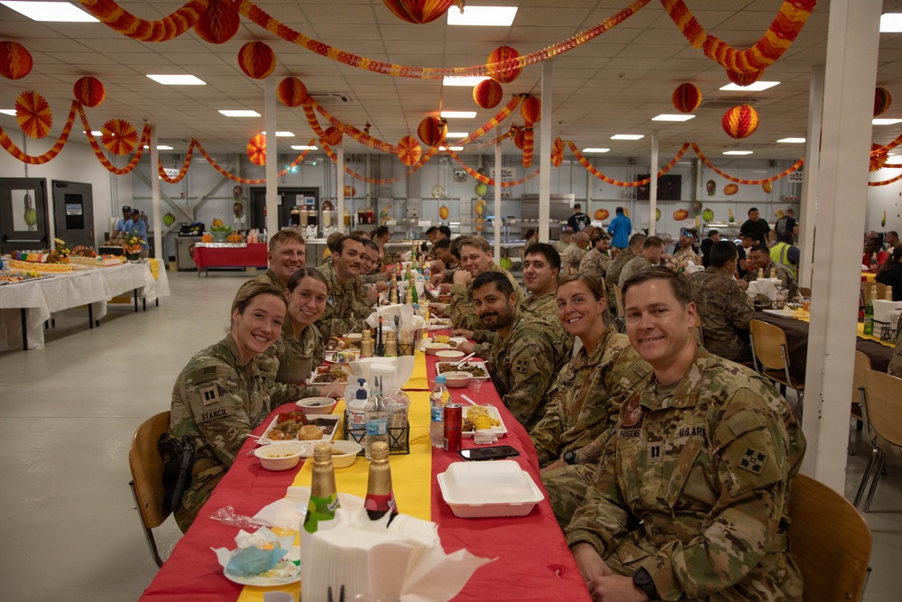 Soldiers are served up a Thanksgiving Meal courtesy of DFACs and Leadership