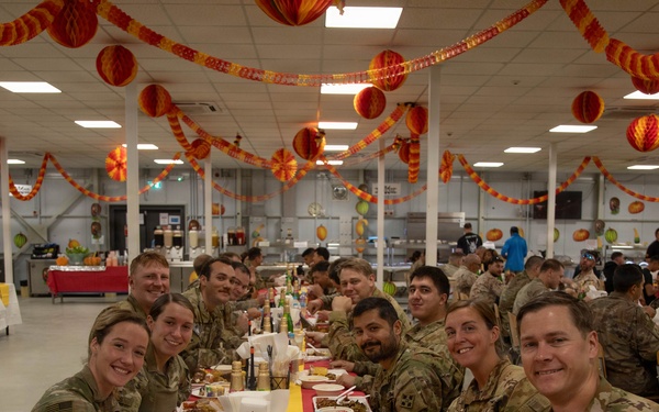 Soldiers are served up a Thanksgiving Meal courtesy of DFACs and Leadership