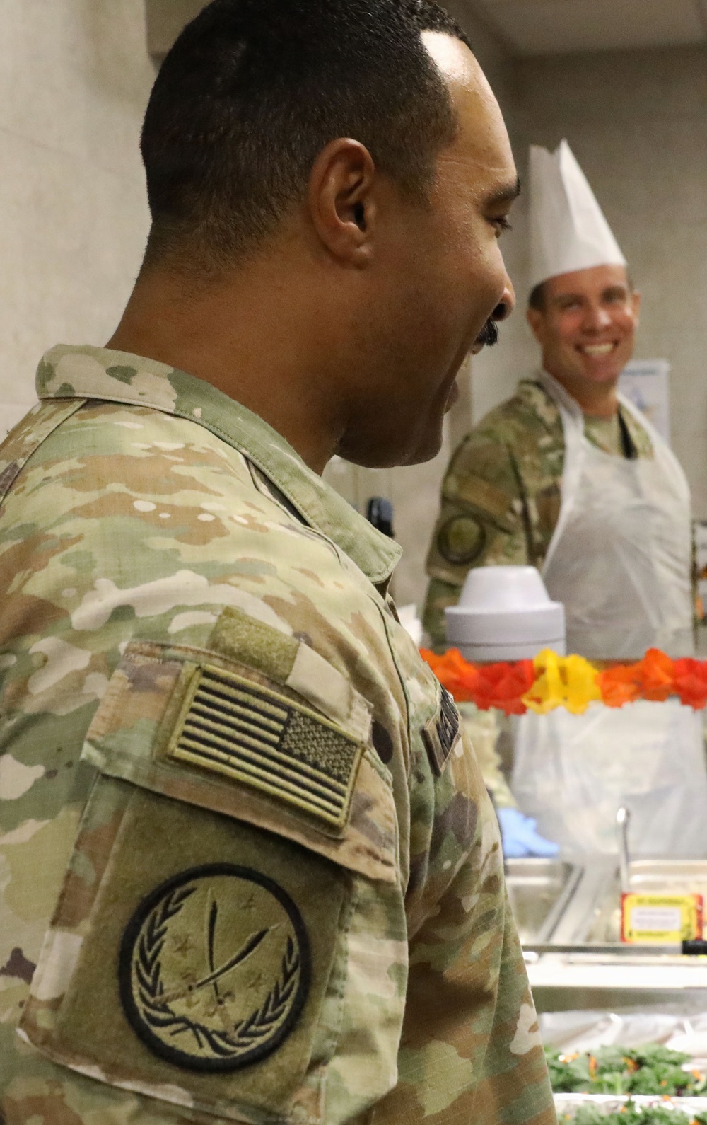 Soldiers are served Thanksgiving dinner at Camp Arifjan, Kuwait