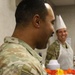 Soldiers are served Thanksgiving dinner at Camp Arifjan, Kuwait