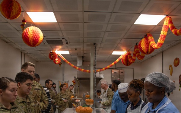 Soldiers are served up a Thanksgiving Meal courtesy of DFACs and Leadership