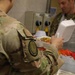 Soldiers are served Thanksgiving dinner at Camp Arifjan, Kuwait