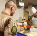 Soldiers are served Thanksgiving dinner at Camp Arifjan, Kuwait
