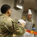 Soldiers are served Thanksgiving dinner at Camp Arifjan, Kuwait