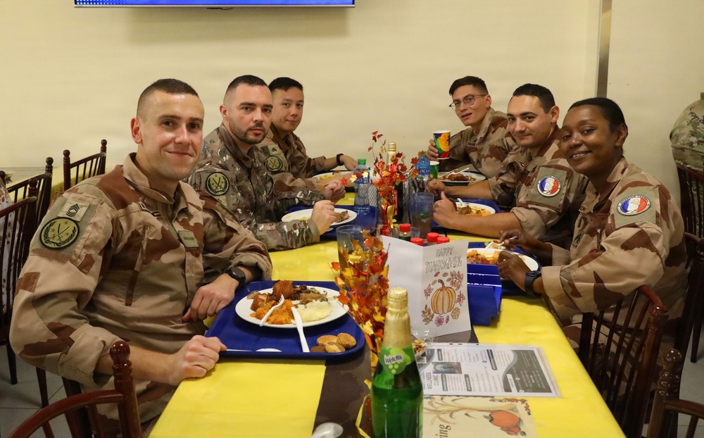 Soldiers are served Thanksgiving dinner at Camp Arifjan, Kuwait