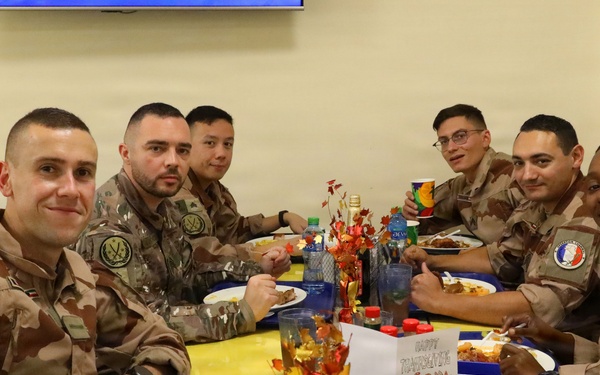 Soldiers are served Thanksgiving dinner at Camp Arifjan, Kuwait