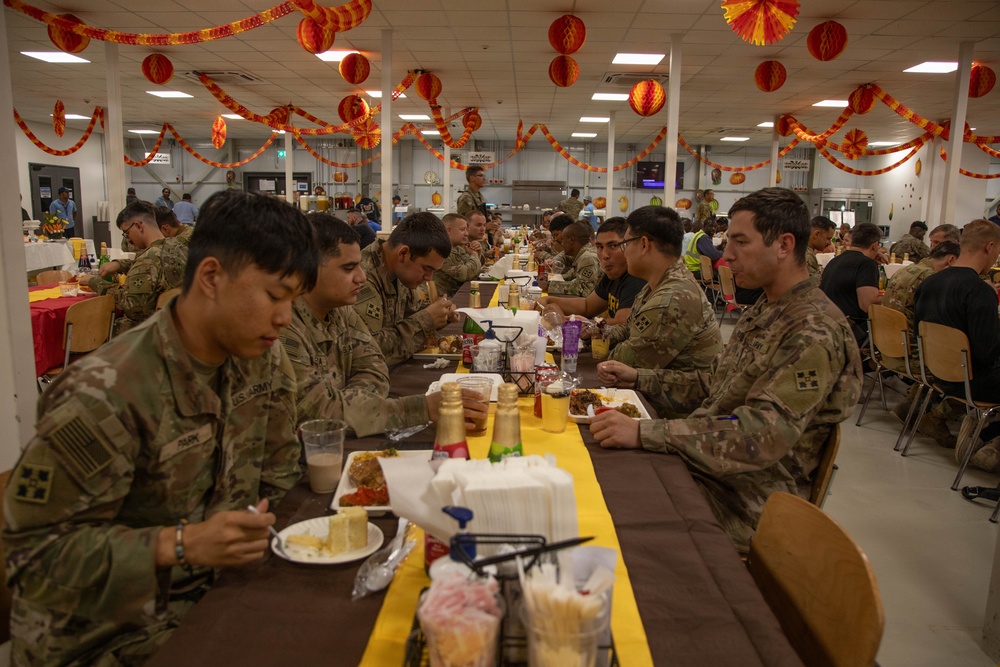 Soldiers are served up a Thanksgiving Meal courtesy of DFACs and Leadership