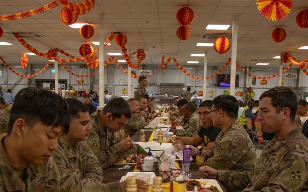 Soldiers are served up a Thanksgiving Meal courtesy of DFACs and Leadership