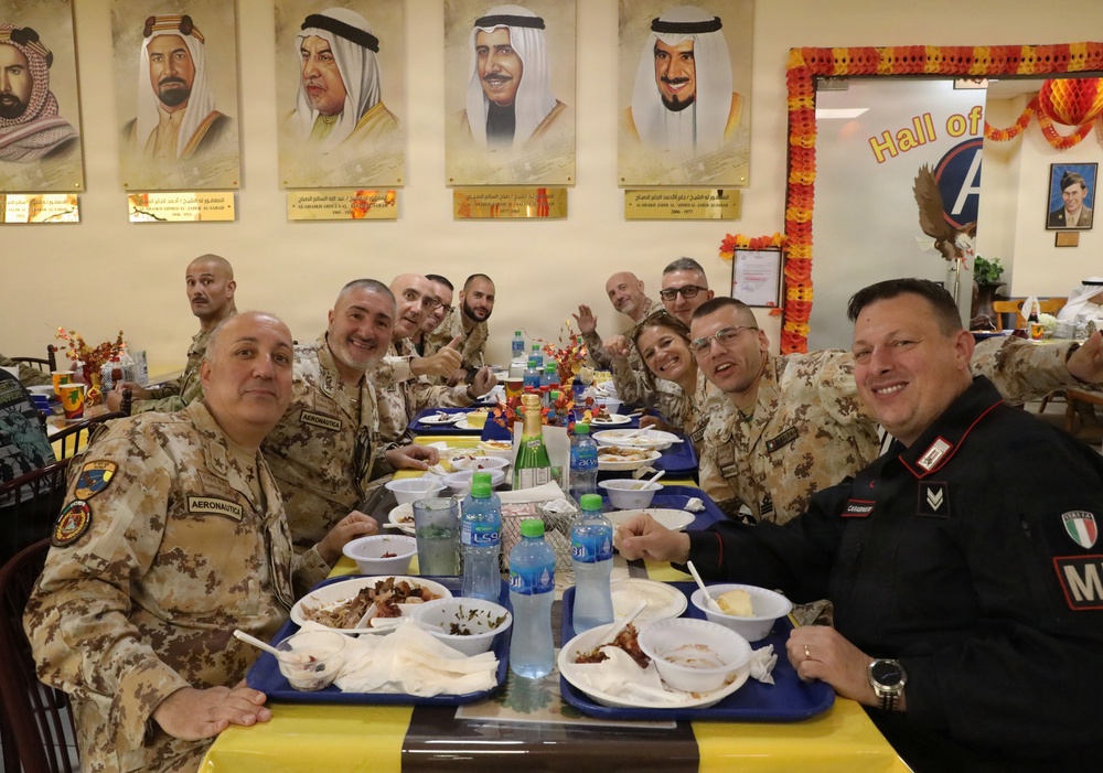 Soldiers are served Thanksgiving dinner at Camp Arifjan, Kuwait